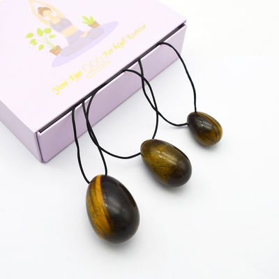 4pcs Tiger Eye Drilled Yoni Uova e bacchette Set con scatola Perfetto per le vacanze e la collezione di statue in pietra