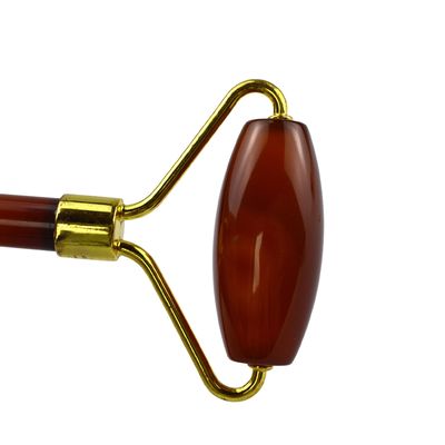Disponibile il logo personalizzato del prodotto di bellezza facciale Carnelian Guasha Face Roller per massaggiatore di agata rosso cristallino naturale al 100%