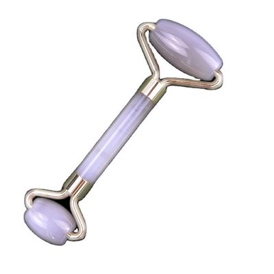 Roller di agate grigio per massaggi facciali per la cura naturale della pelle e lo smaltimento facciale
