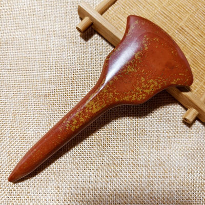 Scopri i benefici curativi del massaggio a tutto il corpo e della stimolazione degli acupointi con la tavola Gua Sha di Bian Stone rosso
