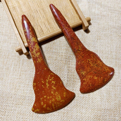 Scopri i benefici curativi del massaggio a tutto il corpo e della stimolazione degli acupointi con la tavola Gua Sha di Bian Stone rosso