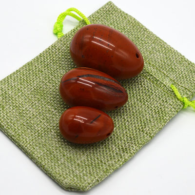 Uova di giada perforate in giaspo rosso Set di uova Yoni naturali per la salute fisiologica delle donne OEM approvato