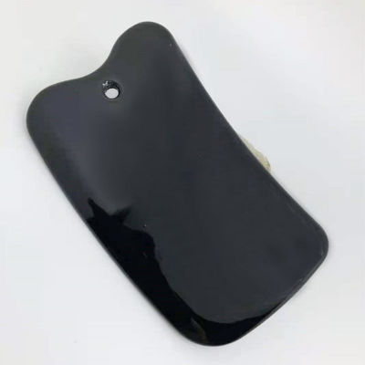 Tavola di raschiatura del corpo in vetro nero-ceramica La soluzione perfetta per il massaggio facciale