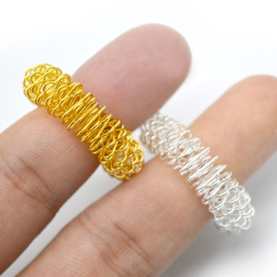 Anello di massaggio a mano per il massaggio del dito per il rilassamento e la terapia mirati