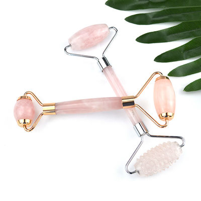 Disponibile il logo personalizzato Natural Rose Quartz Gold Handle Facial Jade Roller Pink Crystal Massager Per Il Trattamento della Bellezza della Pelle
