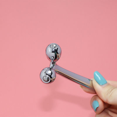 Ball Face Gua Sha Metal Roller Gua Sha Stainless Steel Face Roller per la cura della pelle con logo del cliente e funzione musicale