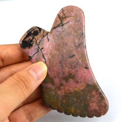 Strumento di massaggio naturale di Rhodonite Gua Sha per stringere la pelle e promuovere la bellezza facciale