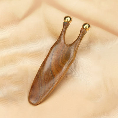 Strumento di massaggio Gua Sha di legno di sandalo di rame puro per la stimolazione del viso e degli occhi
