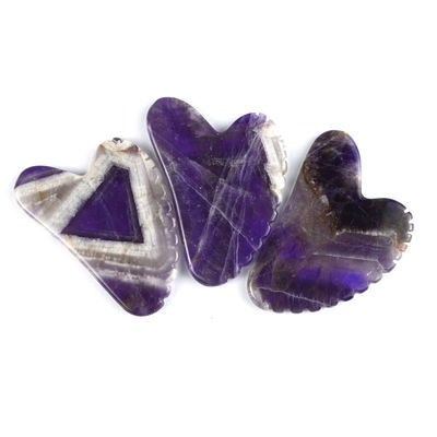 2024 Strumenti di massaggio di tendenza Forma di cuore Ametista naturale Gua Sha con denti Logo personalizzato Guasha Body Self Skin Care