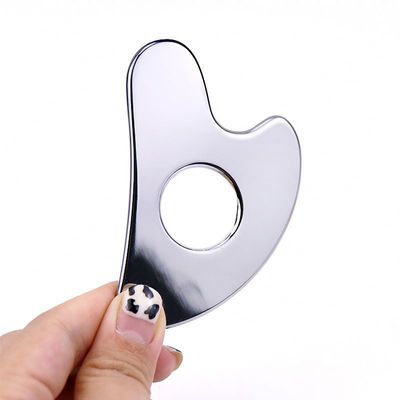 Acciaio inossidabile a forma di cuore Hollow Gua Sha Board Metal Facial Beauty Tool per l'area di massaggio del corpo intero e OEM / ODM