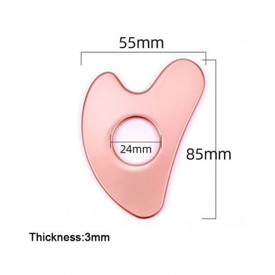 Acciaio inossidabile a forma di cuore Hollow Gua Sha Board Metal Facial Beauty Tool per l'area di massaggio del corpo intero e OEM / ODM