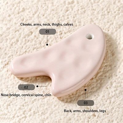 Sperimenta i benefici dell' strumento ceramico Gua Sha cura della salute personale per massaggi facciale e corporeo