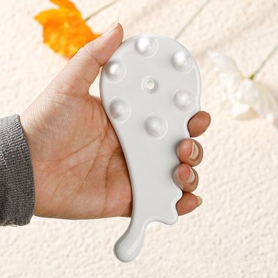 Prova il potere curativo del pettine ceramico Gua Sha per massaggi facciale e corporeo