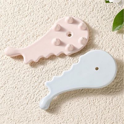 Prova il potere curativo del pettine ceramico Gua Sha per massaggi facciale e corporeo