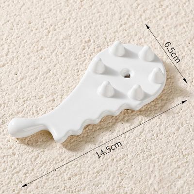 Prova il potere curativo del pettine ceramico Gua Sha per massaggi facciale e corporeo