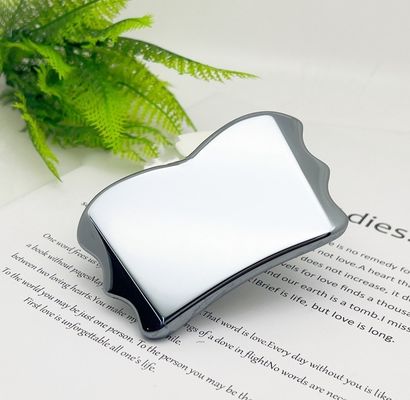 Scopri i vantaggi dell' strumento di raschiatura a forma di ala Terahertz Gua Sha per massaggi del corpo e cure sanitarie