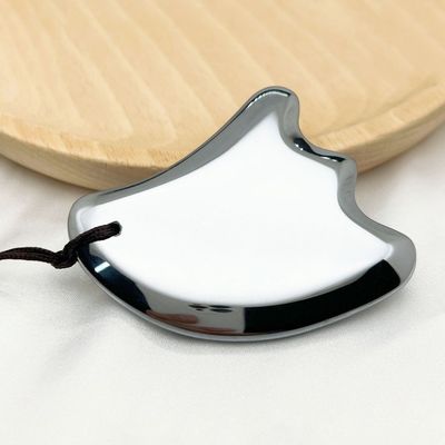 Massaggiatore facciale forma ala Terahertz Scraping Plate attrezzatura di massaggio del corpo per massaggio facelift