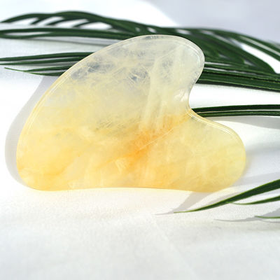 Tabella di raschiatura a forma di cuore naturale giallo citrino gua sha per strumento di massaggio facciale e corporeo