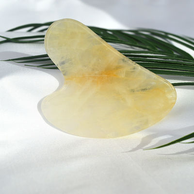 Tabella di raschiatura a forma di cuore naturale giallo citrino gua sha per strumento di massaggio facciale e corporeo