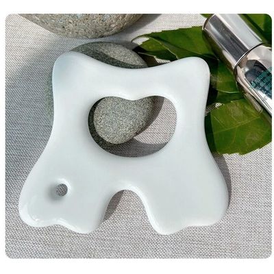 Strumento per la cura della pelle per la bellezza Facial Gua Sha Board per massaggi in ceramica e rilassamento muscolare