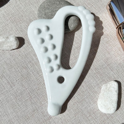 Cura della pelle Gua Sha massaggiatore facciale Guasha strumento di drenaggio linfatico per il viso e il massaggio del corpo