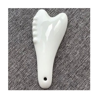 Strumento di massaggio Gua Sha in ceramica bianca per l'acupressione Massaggio facciale e corporeo