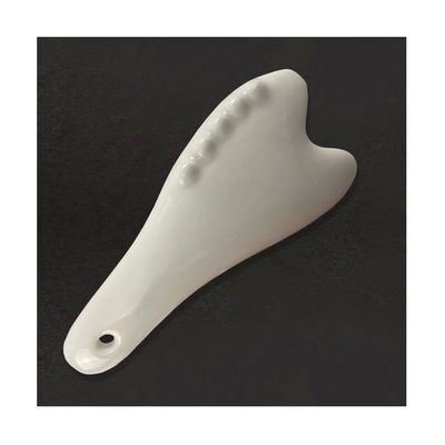 Strumento di massaggio Gua Sha in ceramica bianca per l'acupressione Massaggio facciale e corporeo