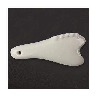 Strumento di massaggio Gua Sha in ceramica bianca per l'acupressione Massaggio facciale e corporeo