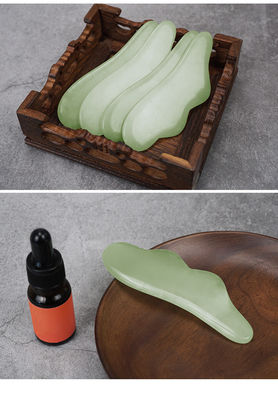 Strumenti di massaggio Xiuyan Jade 100% naturale a doppio lato Jade Stone Roller per stimolare il flusso sanguigno e alleviare lo stress