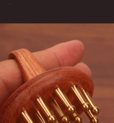Pellicola di legno lucidato di rame Pellicola di capello di legno massaggio Pellicola di legno per donne Pellicola Guasha con lucidatura tecnica