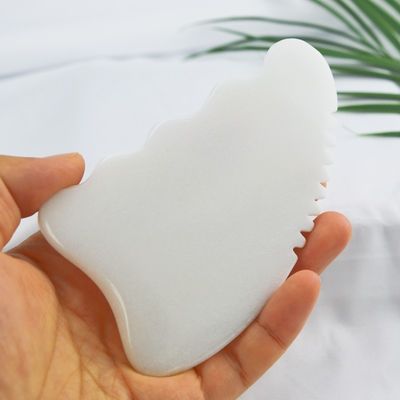 Disponibile il logo personalizzato di White Jade Gua Sha Stone Facial Massager per il trattamento anti-invecchiamento