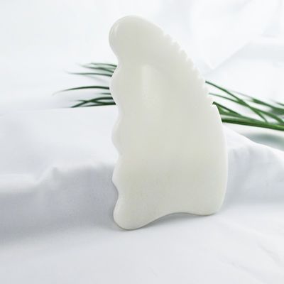 Disponibile il logo personalizzato di White Jade Gua Sha Stone Facial Massager per il trattamento anti-invecchiamento