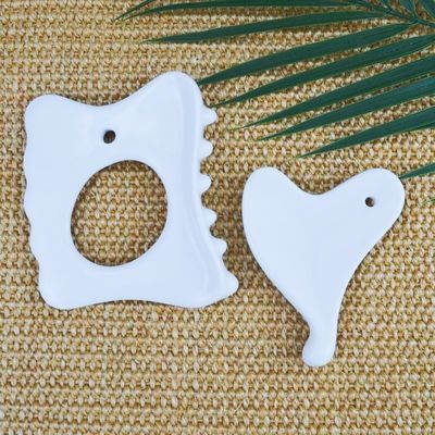Tabella di ceramica Gua Sha per il rilassamento muscolare su tutto il corpo