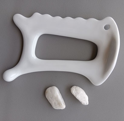 Tavola ceramica Gua Sha professionale per migliorare la circolazione sanguigna e il rilassamento