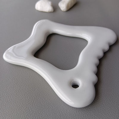 Attrezzatura per massaggi del corpo 2024 attrezzatura di massaggio in ceramica portatile Gua Sha per la cura della pelle