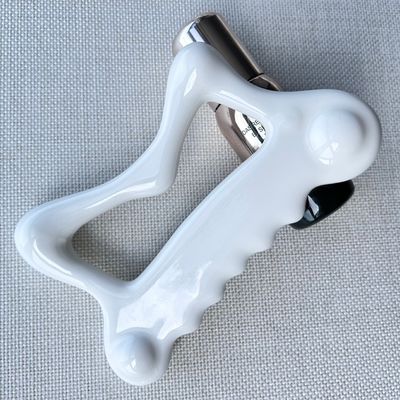 Strumento di massaggio in ceramica Gua Sha per massaggiare il viso Massaggiatore corpo cura della pelle Spa Facial lifting attrezzature di bellezza