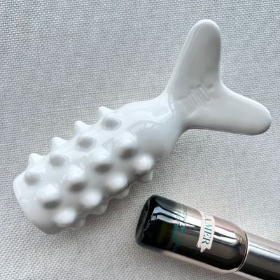 Attrezzatura per il massaggio del corpo Masseria ceramica a forma di pesce per il drenaggio linfatico e il trattamento della bellezza