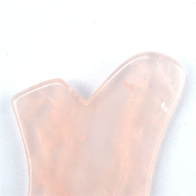 Massaggiatore facciale 2024 Rose Quartz Gua Sha Stone per la cura della pelle del corpo e attrezzature di massaggio del corpo Proprietà