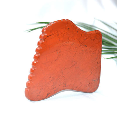 Proprietà del massaggiatore Giappone rosso naturale Gua Sha strumento per il massaggio facciale