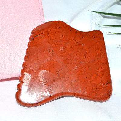 Proprietà del massaggiatore Giappone rosso naturale Gua Sha strumento per il massaggio facciale