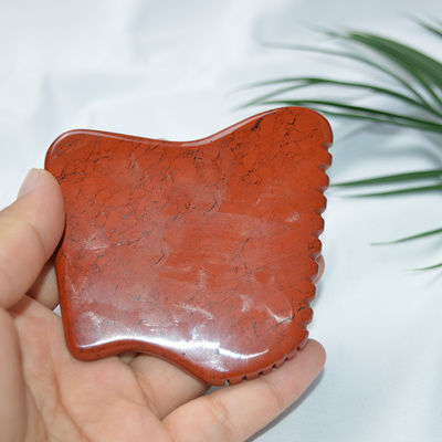 Proprietà del massaggiatore Giappone rosso naturale Gua Sha strumento per il massaggio facciale