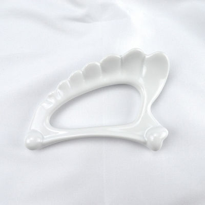 Strumenti di massaggio 2024 forma ala ceramica Gua Sha Massaggiatore a mano per il corpo Massaggiatore drenaggio linfatico e strumento anti invecchiamento