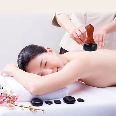 Massaggiatore elettrico di gua sha calda pietra terapia per rilassare i muscoli raschiatura della pelle e trattamento di moxibustione sul corpo