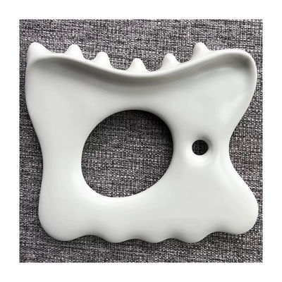 Alleviare lo stress muscolare e il dolore con il logo personalizzato ceramica Gua Sha strumento mascella massaggio linea