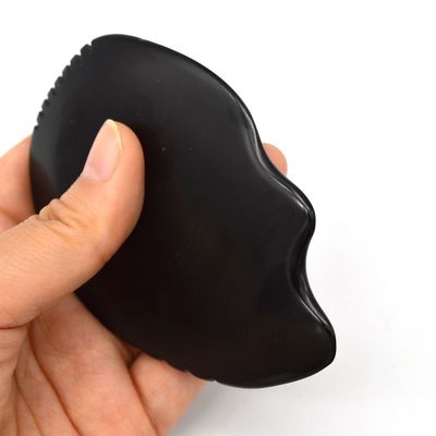 Strumento di massaggio tradizionale in pietra Bian Gua Sha per la rivitalizzazione della salute del corpo