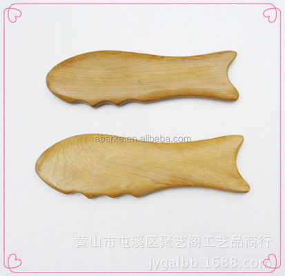 Strumento Gua Sha a forma di pesce in legno da 140*45mm Perfetto per massaggi e disintossicazione