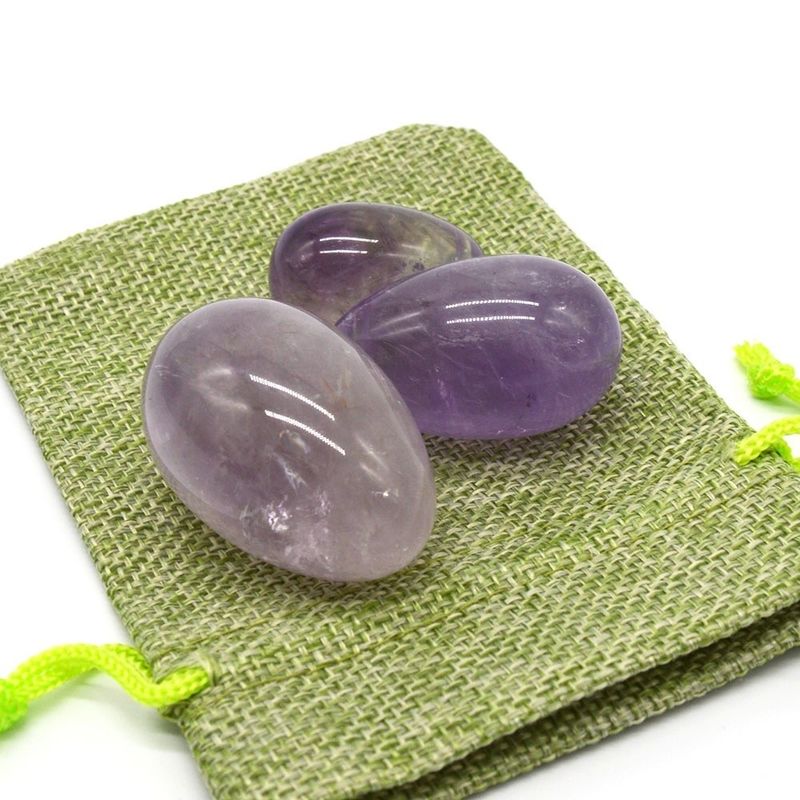 OEM Accepted Carved Yoni Egg for Vaginal Exercise Uova di giada di ametista perforate naturali