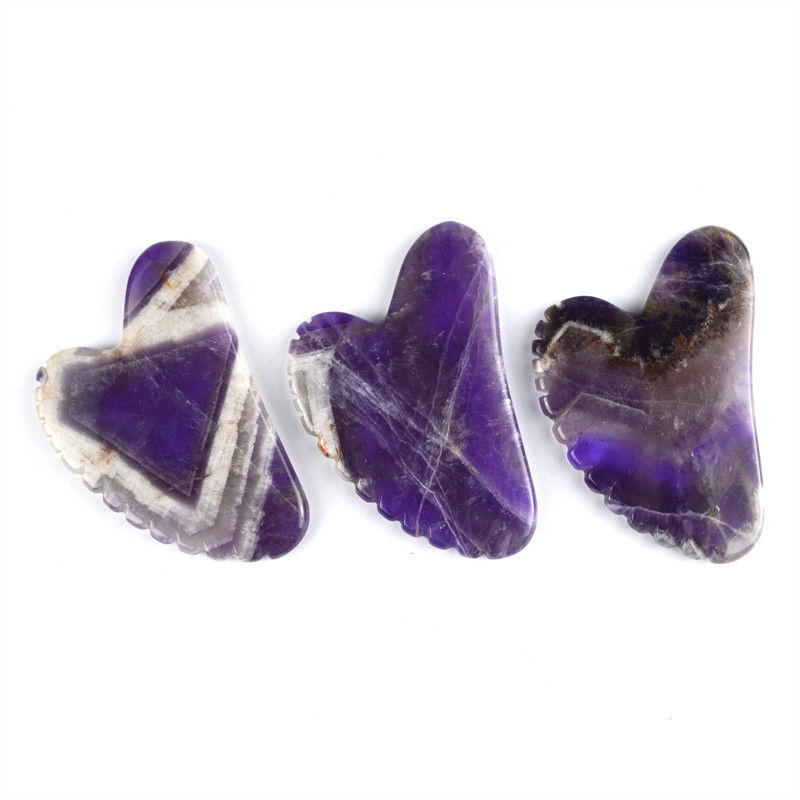 2024 Strumenti di massaggio di tendenza Forma di cuore Ametista naturale Gua Sha con denti Logo personalizzato Guasha Body Self Skin Care