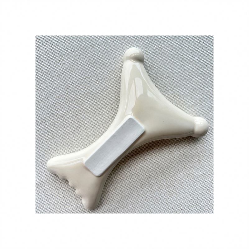OEM/ODM Ceramica a forma di X Gua Sha Scraping Massaggiatore Salone di bellezza Essenziale per il rilassamento facciale